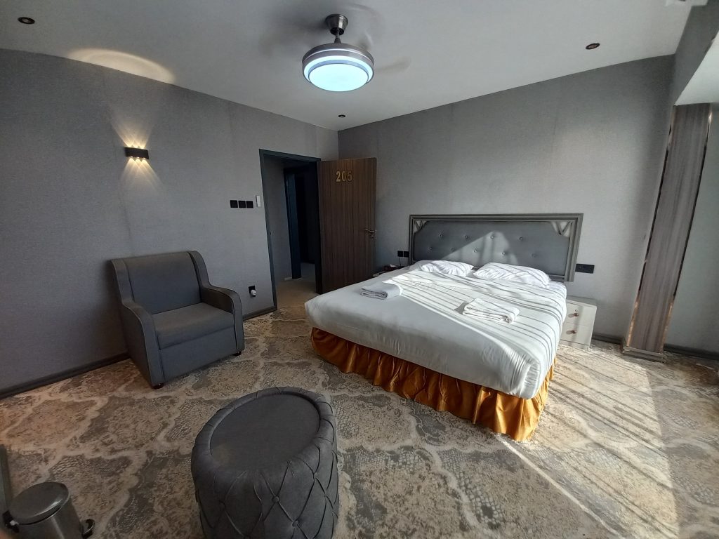 Book the Double Room Sur Hotel Oman, a compact 9 m² private room with one double bed, private bathroom, air conditioning, and space for two adults.